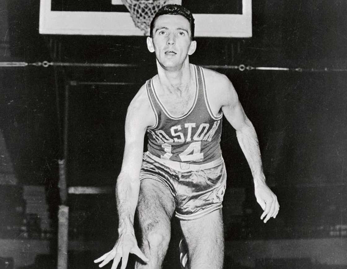 Bob Cousy bouncing a ball