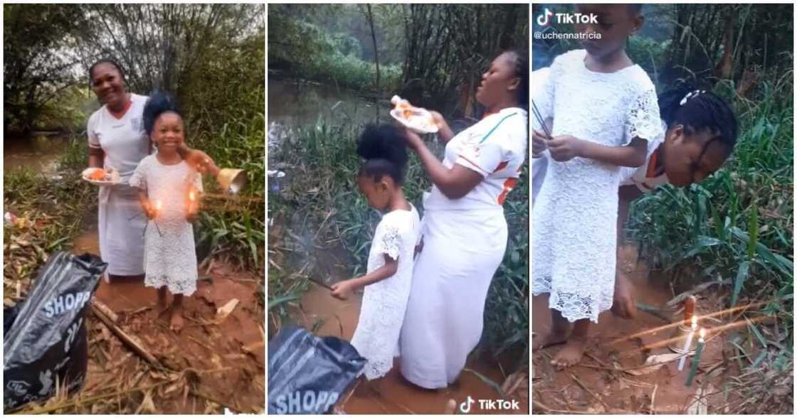Nigerian lady, water child, 5th birthday, river, lady takes child to river on her birthday Nigerian lady, water child, 5th birthday, river, lady takes child to river on her birthday