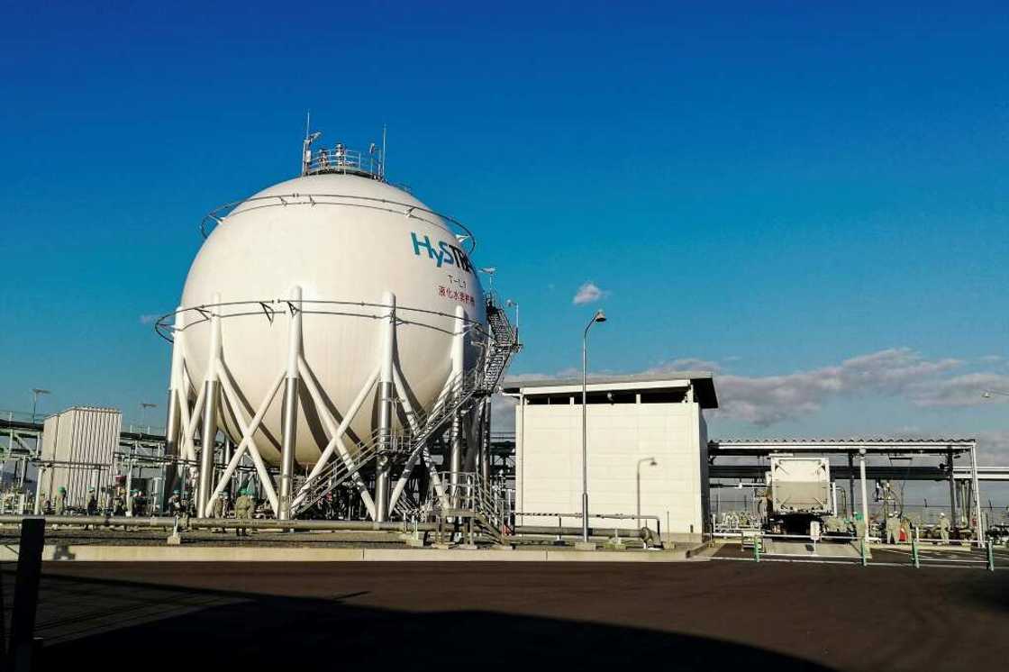 A picture taken in October 2020 shows a tank containing liquid hydrogen at Kobe Port Island plant A picture taken in October 2020 shows a tank containing liquid hydrogen at Kobe Port Island plant