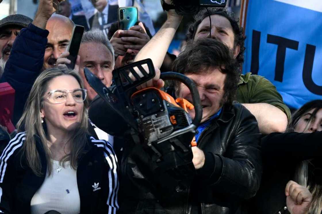 Before the election in which he trounced Argentina's traditional political parties, Milei would campaign with a powered-up chainsaw to symbolize his plans to cut a bloated state Before the election in which he trounced Argentina's traditional political parties, Milei would campaign with a powered-up chainsaw to symbolize his plans to cut a bloated state