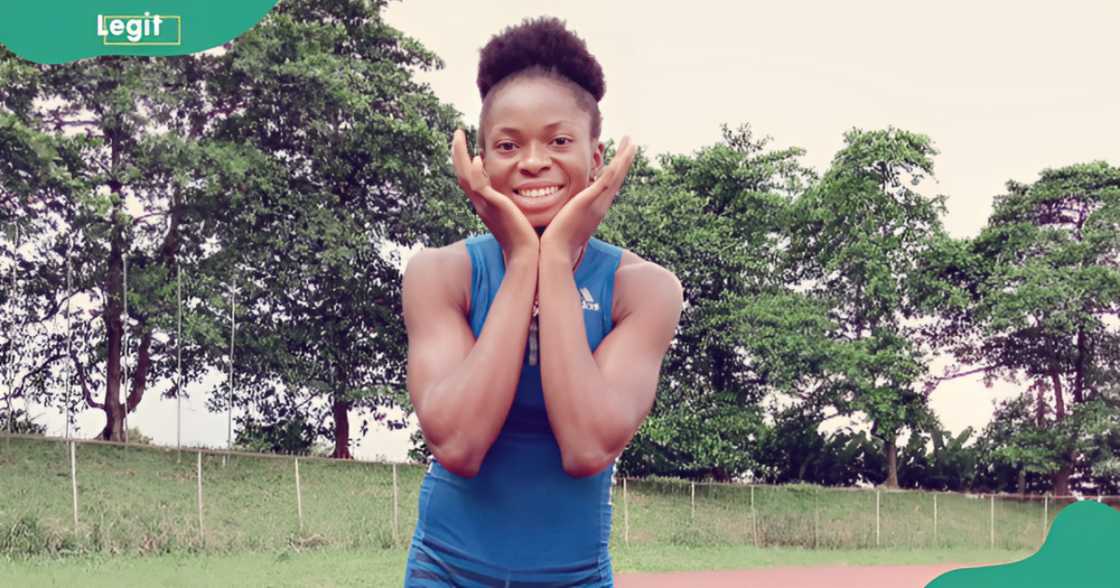 Oghenekaro Brune stands in a track field