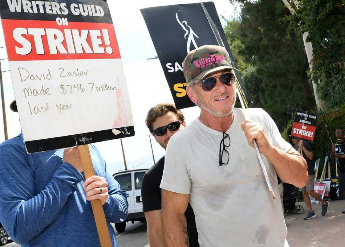 Actors including Sean Penn have joined members of the Writers Guild of America on the picket lines