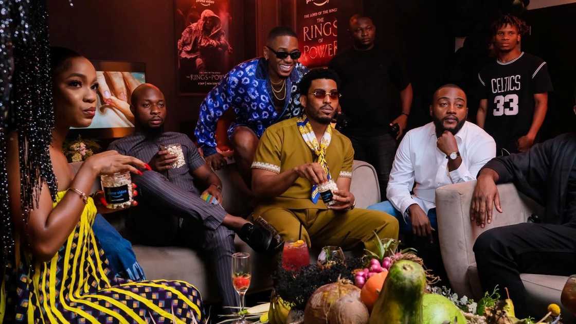 Nigerian celebrities sit on a couch watching The Rings Of Power during a Prime Video watch party. Nigerian celebrities sit on a couch watching The Rings Of Power during a Prime Video watch party.