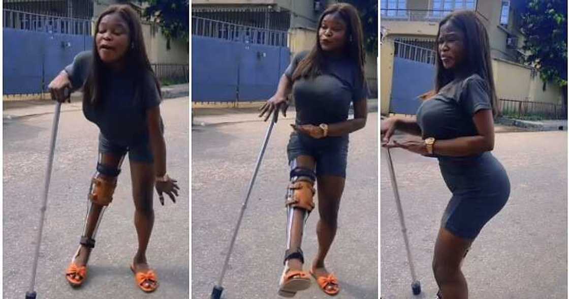 Lady dances with crutches, middle of the road, omentee Lady dances with crutches, middle of the road, omentee