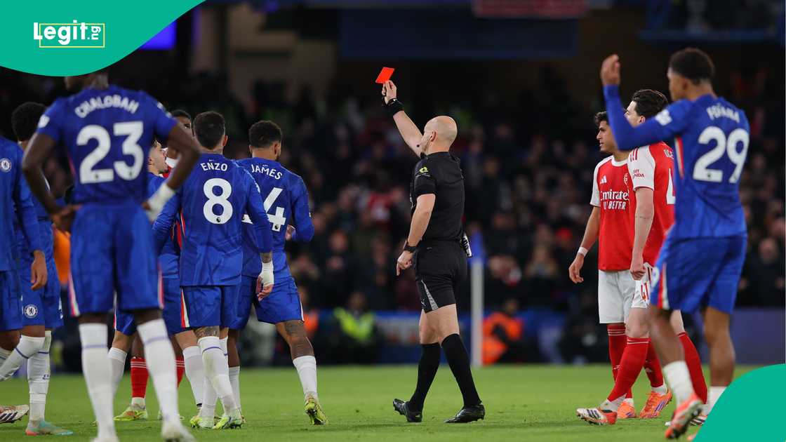 Moises Caicedo shown red card against Arsenal by Anthony Taylor after VAR review. Photo by James Gill