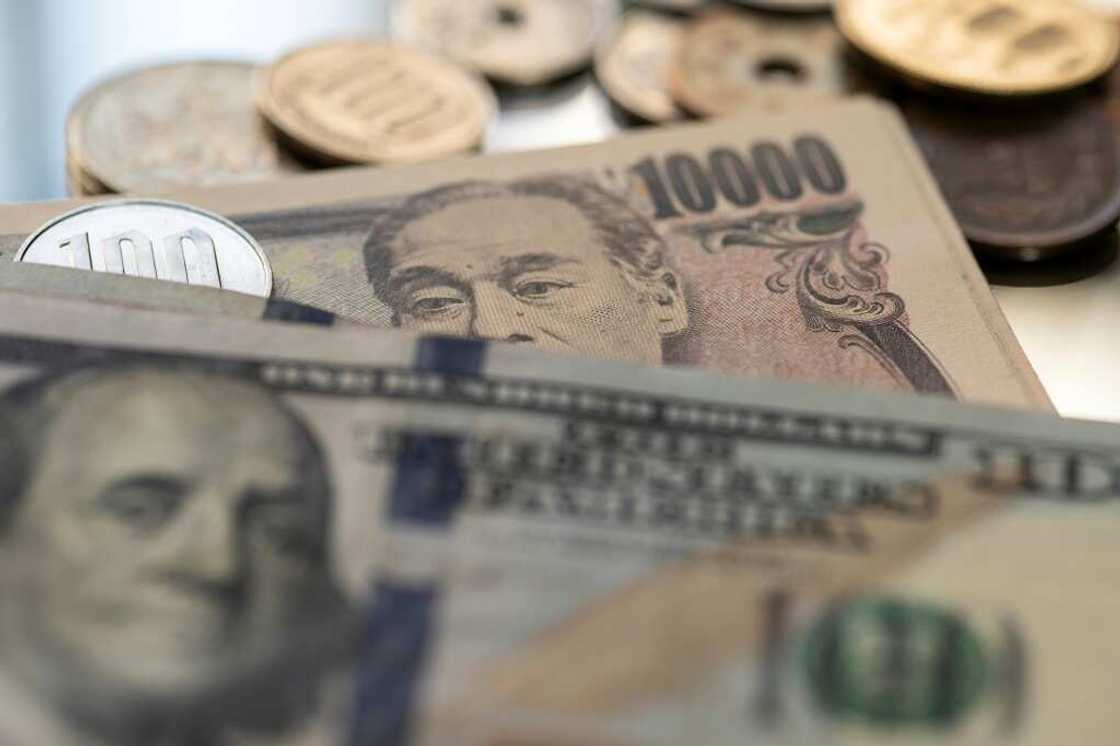 The yen has fallen almost nine percent against the dollar this year, according to Bloomberg The yen has fallen almost nine percent against the dollar this year, according to Bloomberg