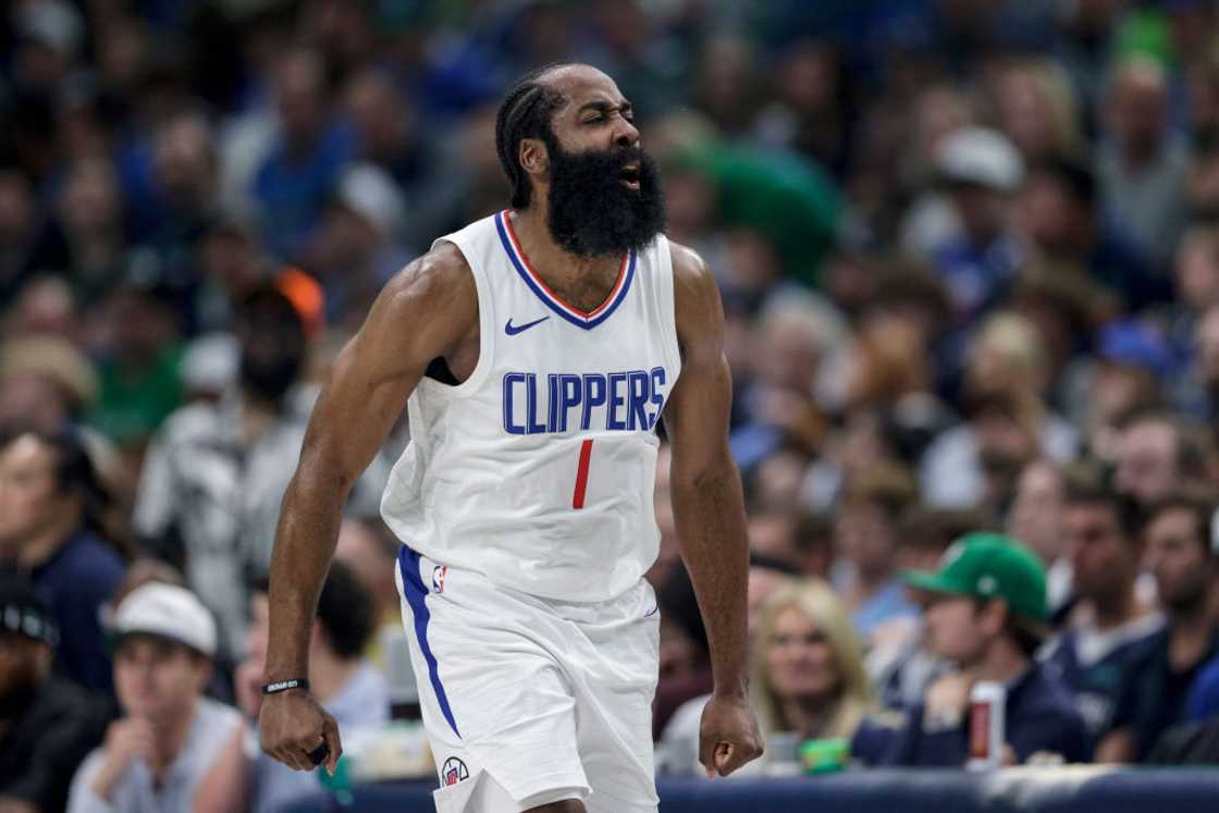 James Harden reacts after a three-point basket in the first half against the Dallas Mavericks