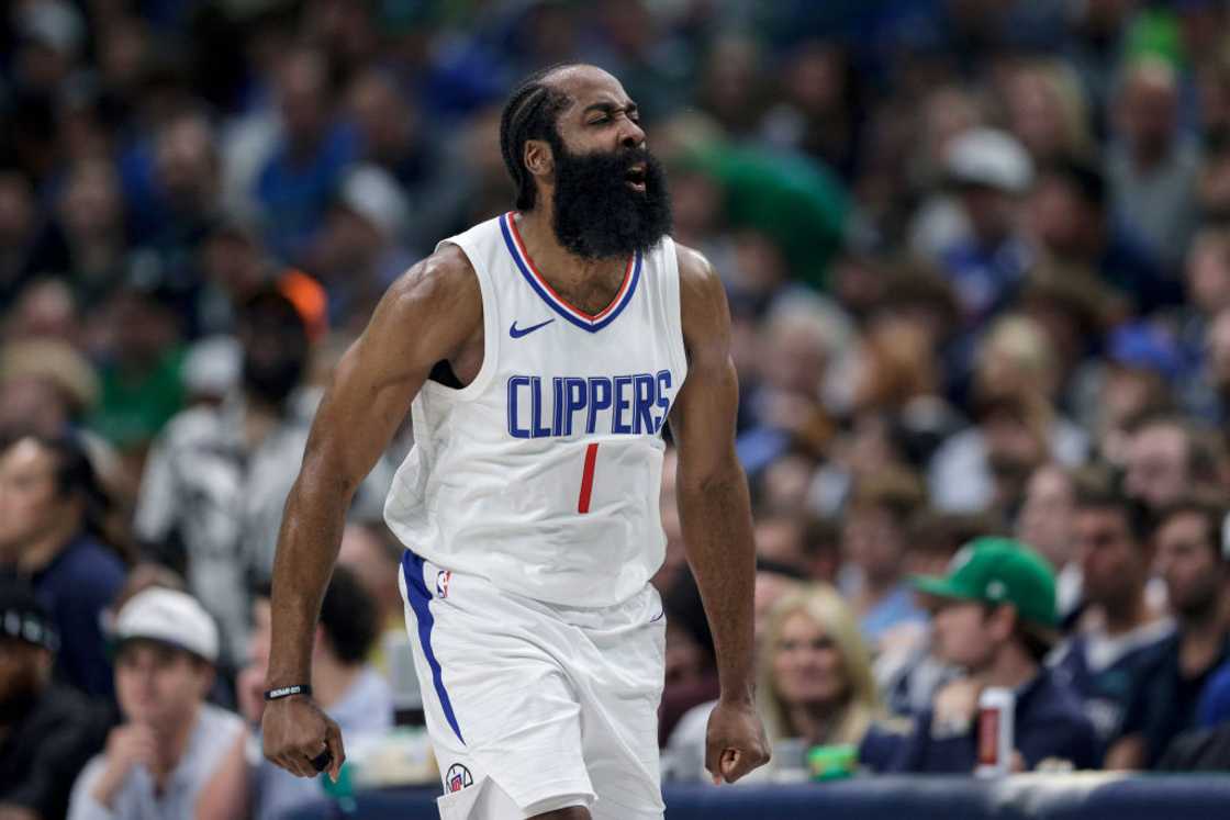 James Harden reacts after a three-point basket in the first half against the Dallas Mavericks James Harden reacts after a three-point basket in the first half against the Dallas Mavericks