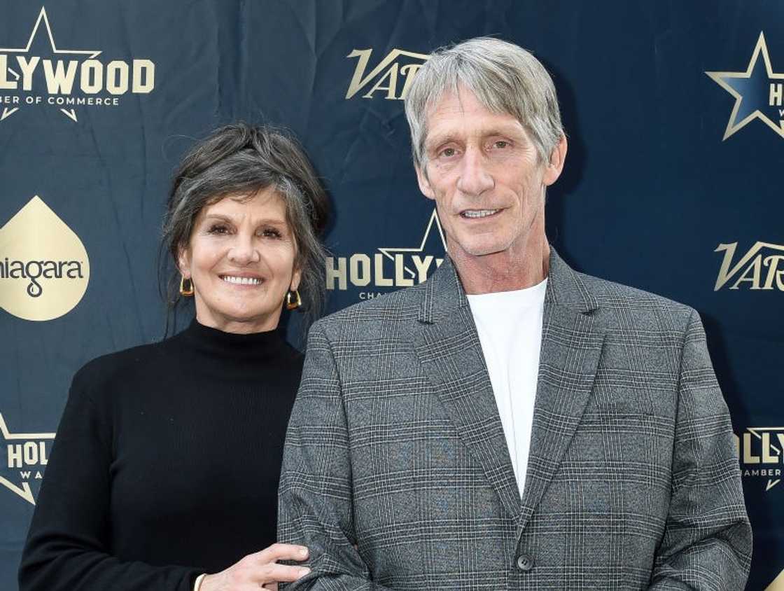 Pam Adkisson and Kevin Von Erich pose on the red carpet Pam Adkisson and Kevin Von Erich pose on the red carpet