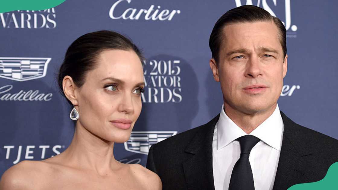 Angelina Jolie Pitt and Brad Pitt appear at an event
