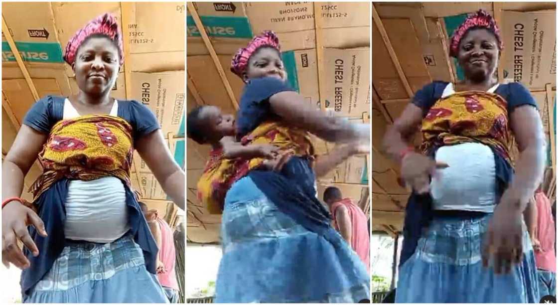 Nigerian mum seen catching fun on Tiktok on Mothers' Day with her baby on her back. Nigerian mum seen catching fun on Tiktok on Mothers' Day with her baby on her back.