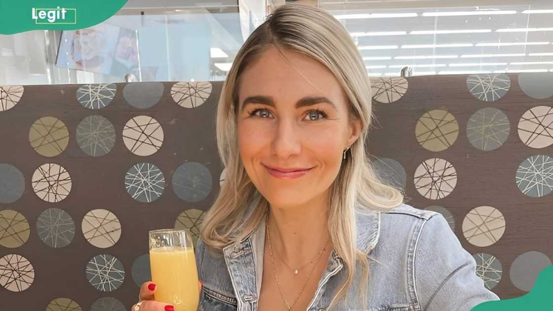 Amanda Hornick enjoys a drink at a restaurant Amanda Hornick enjoys a drink at a restaurant