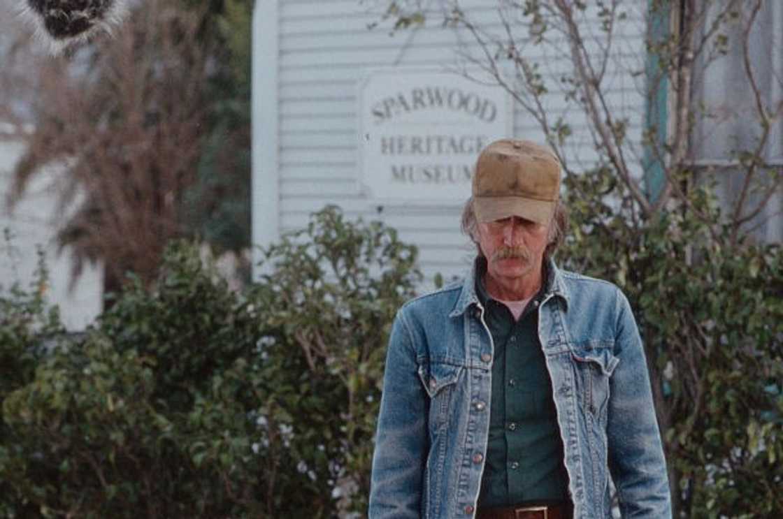 Timothy Scott appears in a film scene