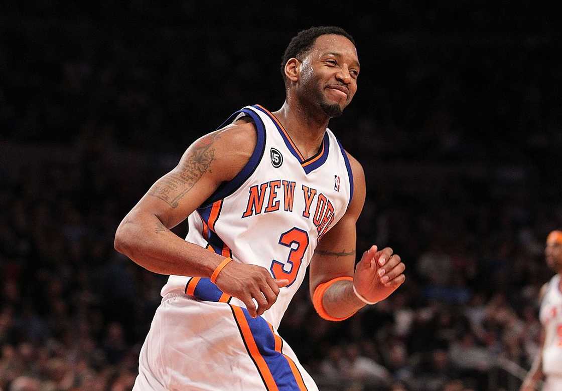 Tracy McGrady smiles after making a basket against the Oklahoma City Thunder