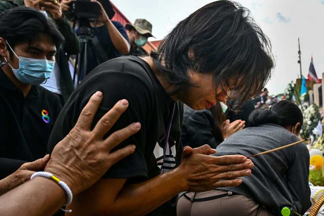 Officials solemnly carried children's treasured possessions out of the nursery to return to families -- favourite blankets and much-loved toys, each carefully placed in name-tagged bags Officials solemnly carried children's treasured possessions out of the nursery to return to families -- favourite blankets and much-loved toys, each carefully placed in name-tagged bags