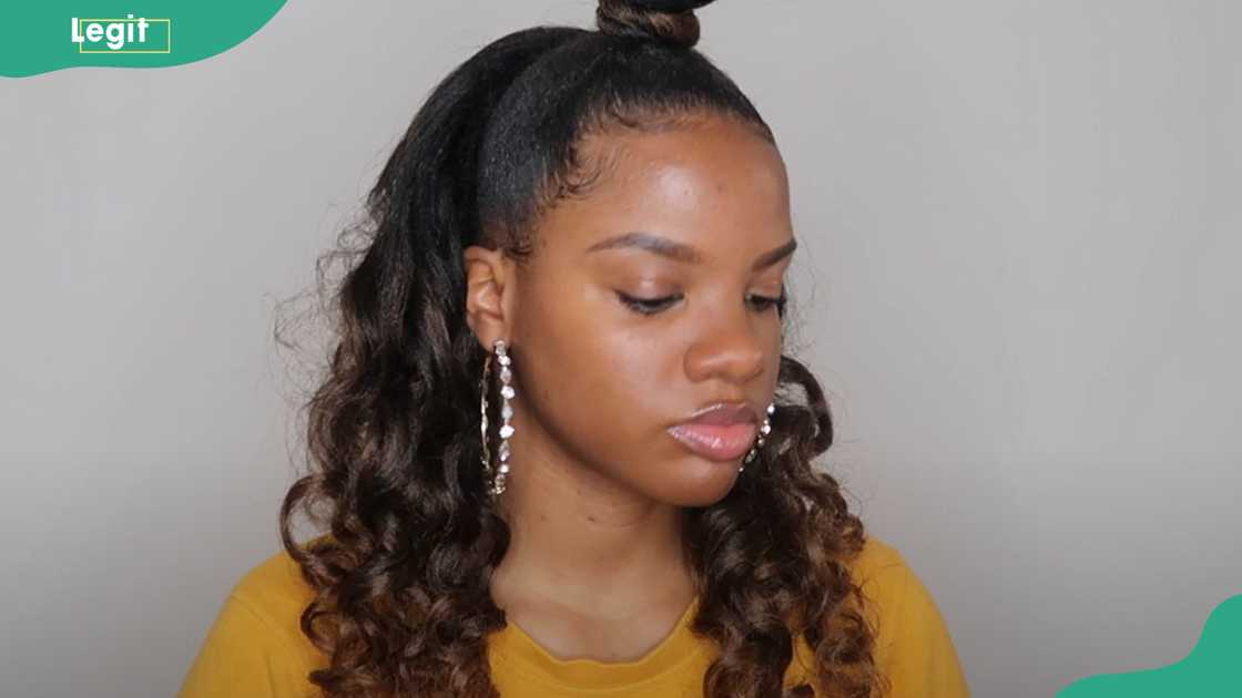 Top knot half up, half down crochet braids Top knot half up, half down crochet braids