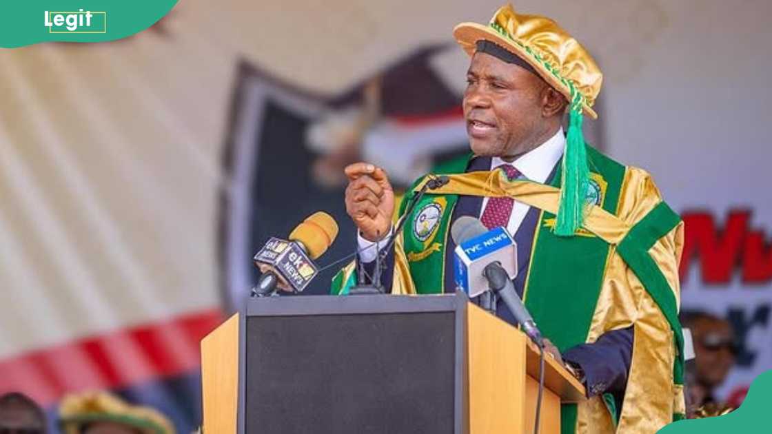 A person gives a speech during a graduation ceremony A person gives a speech during a graduation ceremony