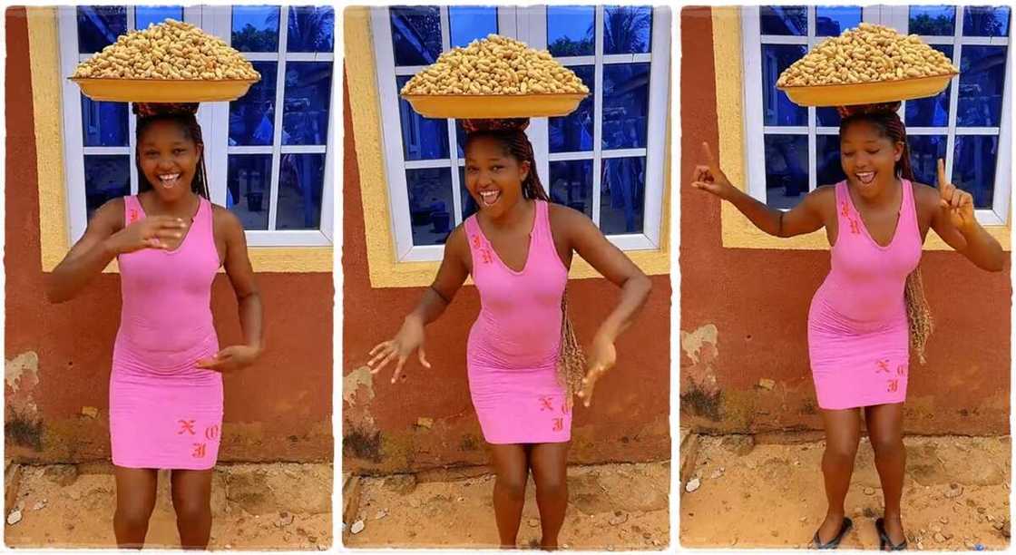 Photo of a groundnut seller who danced with a tray on her head.