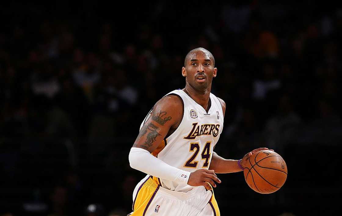 Kobe Bryant drives the ball upcourt during the game against the Cleveland Cavaliers