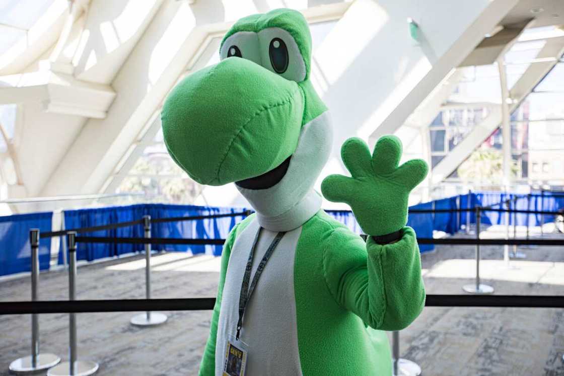 Super Mario Brothers cosplayer Kristy Harrington as Yoshi poses on Day 2 of Comic-Con International in San Diego Super Mario Brothers cosplayer Kristy Harrington as Yoshi poses on Day 2 of Comic-Con International in San Diego