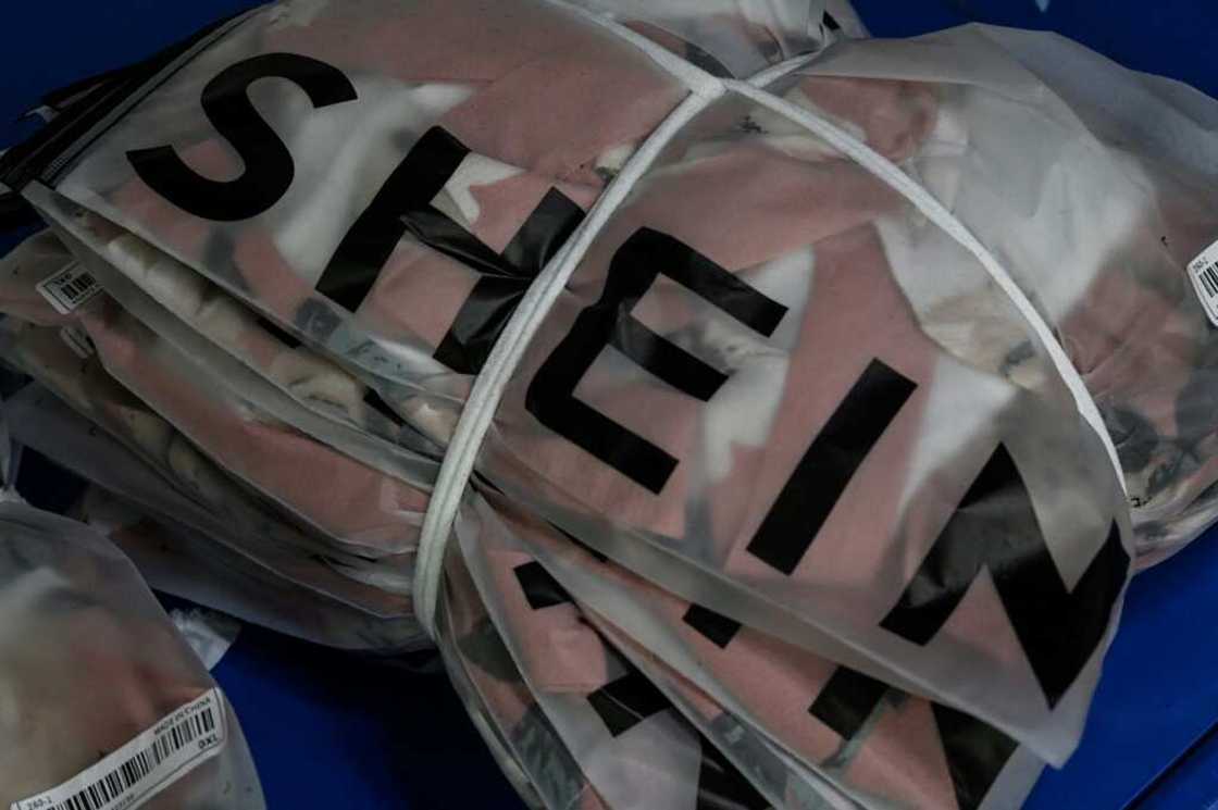 Britain's Boohoo, China's SHEIN and Hong Kong's Emmiol operate the same internet-based business model -- produce items and collections at breakneck speed and rock-bottom prices Britain's Boohoo, China's SHEIN and Hong Kong's Emmiol operate the same internet-based business model -- produce items and collections at breakneck speed and rock-bottom prices