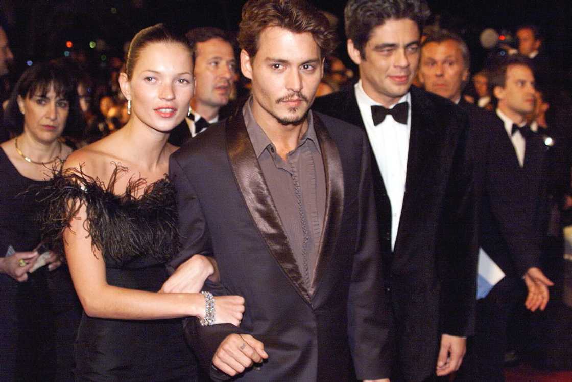 Johnny Depp and Kate Moss arrive an an event