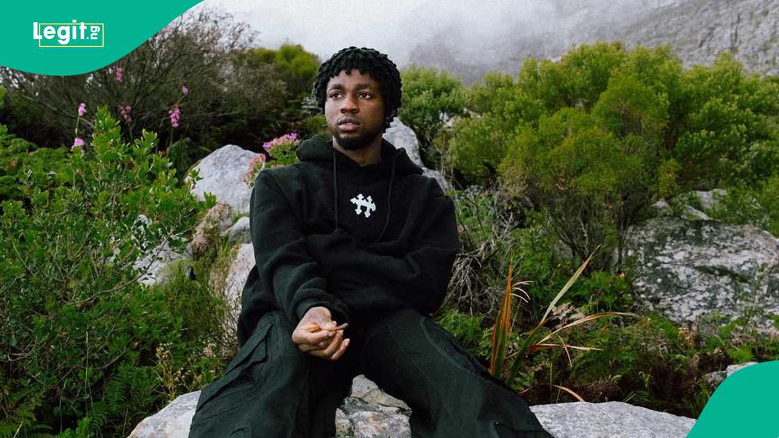 Omah Lay seen cutting his hair in new video, fans react