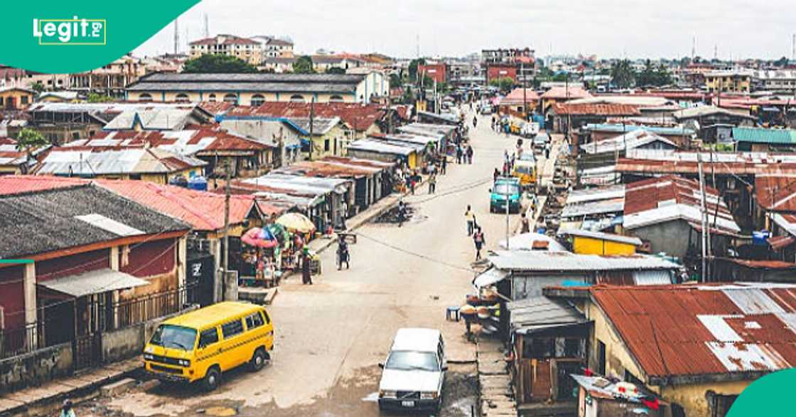 Nigerians seen helping woman whose goods scattered on highway.