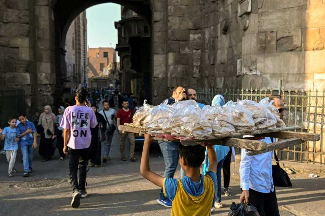 The Arab world's most-populous country is in the grip of a severe economic crisis with high infalation and a tumbling currency The Arab world's most-populous country is in the grip of a severe economic crisis with high infalation and a tumbling currency