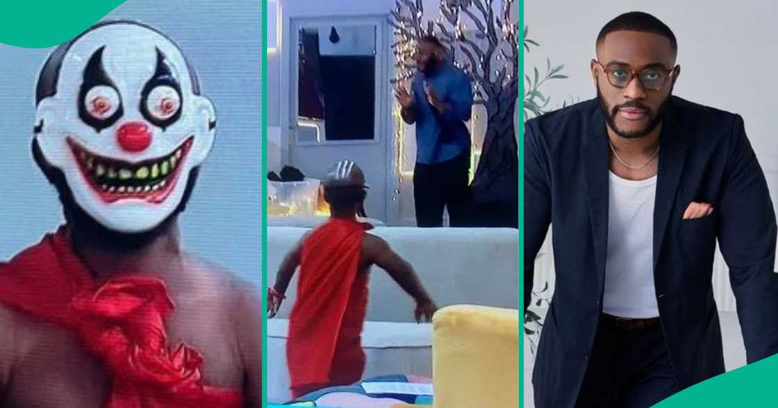 BBNaija housemate Kola screams in fear as masked midget storms BBNaija house BBNaija housemate Kola screams in fear as masked midget storms BBNaija house