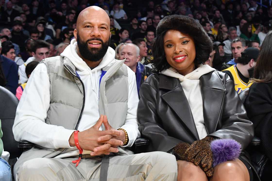 Common and Jennifer Hudson attend an NBA game in Los Angeles, California