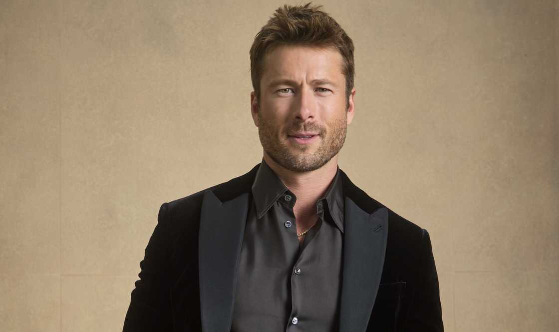 Glen Powell poses for a representation    during the 82nd Annual Golden Globes astatine  The Beverly Hilton.