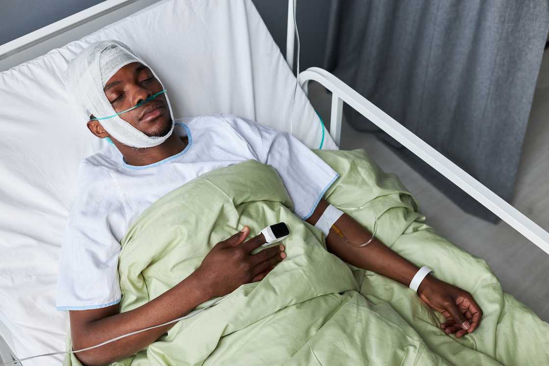 A man in a hospital bed A man in a hospital bed