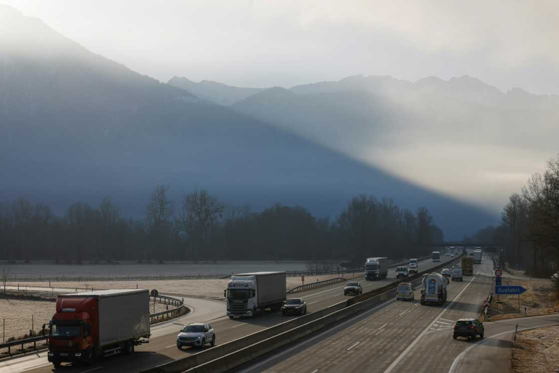 Cars and trucks on the Autobahn close to the highway exit of Oberaudorf, southern Germany on February 6, 2025 Cars and trucks on the Autobahn close to the highway exit of Oberaudorf, southern Germany on February 6, 2025