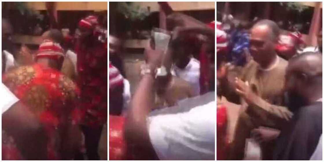 Reactions as FUTO graduates corner their lecturer, dance and spray him cash in cute video Reactions as FUTO graduates corner their lecturer, dance and spray him cash in cute video