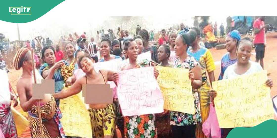 Elderly protesters chant songs while marching through the streets of Enugwu-Agidi. Elderly protesters chant songs while marching through the streets of Enugwu-Agidi.