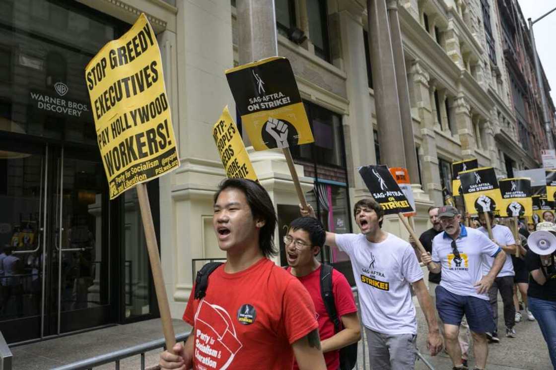 Screen Actors Guild members walk a picket line outside of Warner Bros. Discovery on August 10, 2023, in New York City Screen Actors Guild members walk a picket line outside of Warner Bros. Discovery on August 10, 2023, in New York City