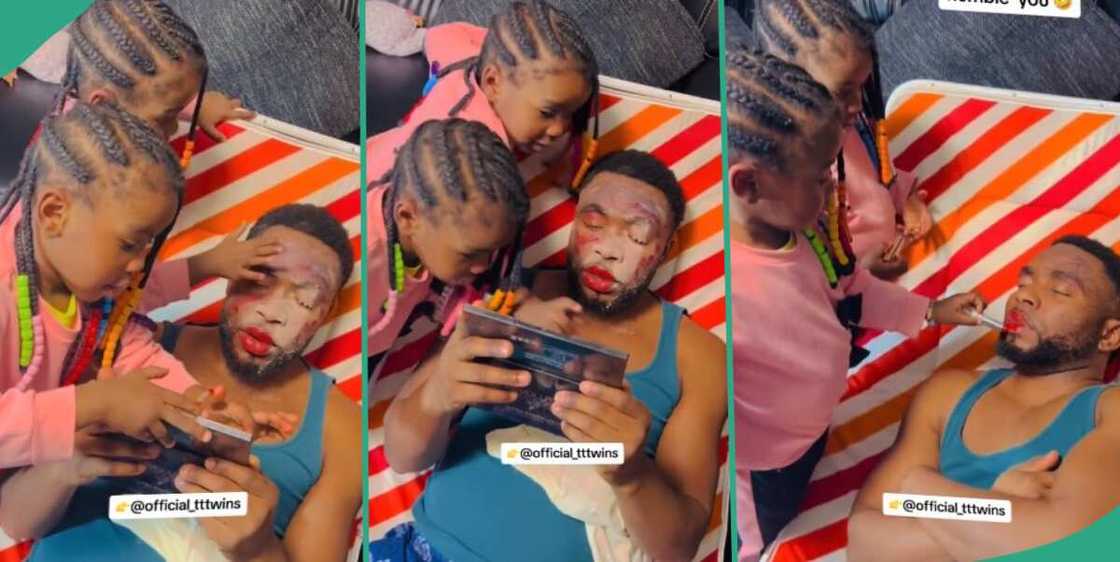 Video emerges as kids make up their dad's face Video emerges as kids make up their dad's face