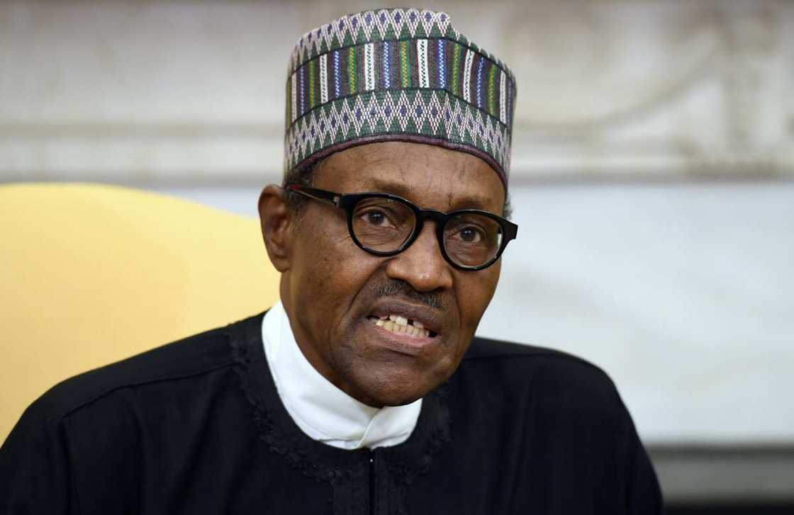 Former Nigerian President Muhammadu Buhari speaks during a meeting Former Nigerian President Muhammadu Buhari speaks during a meeting