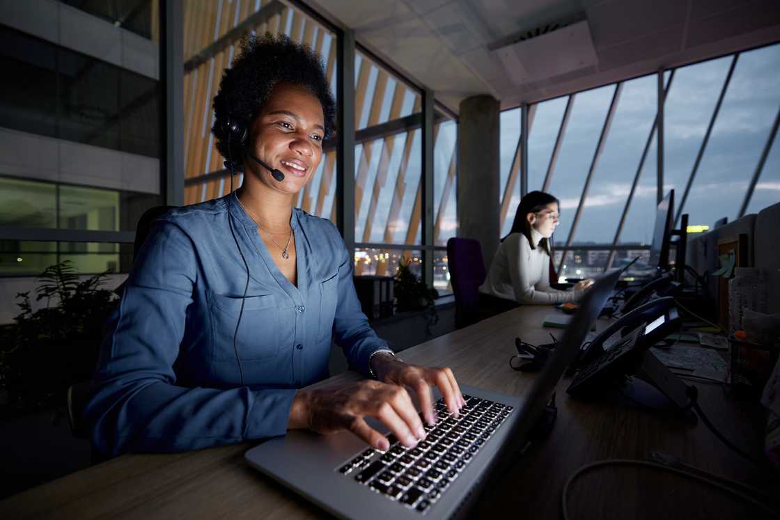 An agent listens emotionally during a call. An agent listens emotionally during a call.