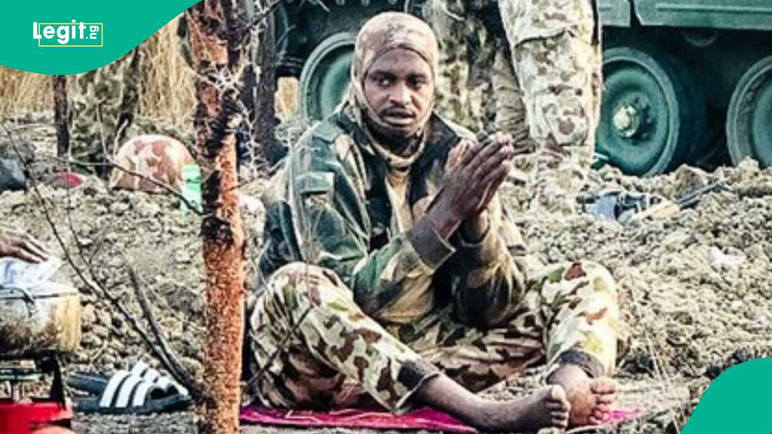 Emotional image of soldier praying against terrorists" Emotional image of soldier praying against terrorists"