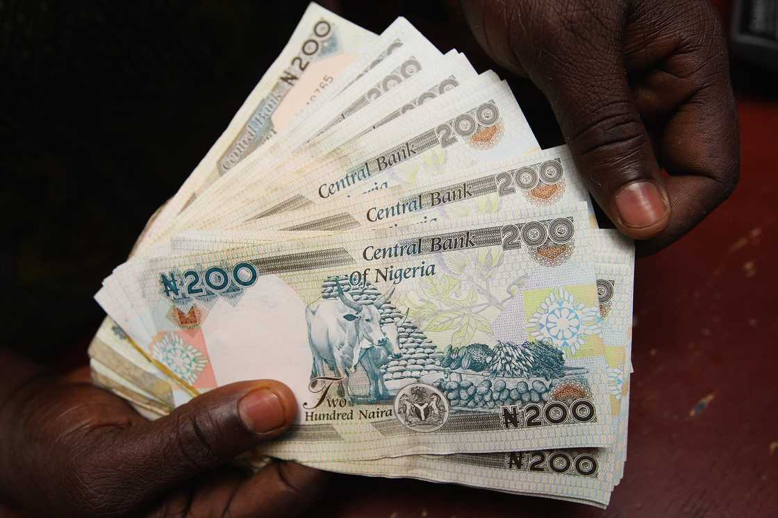 A detail of some Nigerian Naira being counted in an exchange office in Lagos, Nigeria
