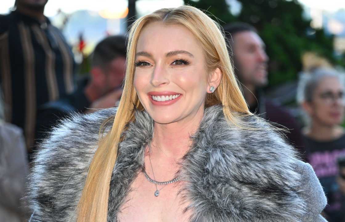 Lindsay Lohan arrives at the Michael Kors fashion show Lindsay Lohan arrives at the Michael Kors fashion show