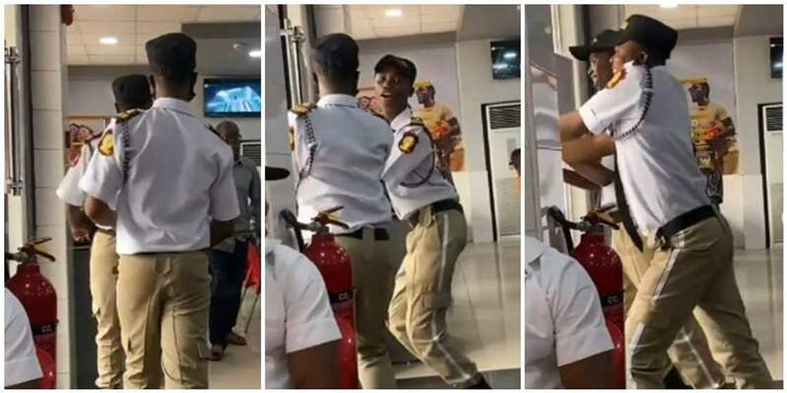 Two security guards and dance and twerk in Nigeria Two security guards and dance and twerk in Nigeria
