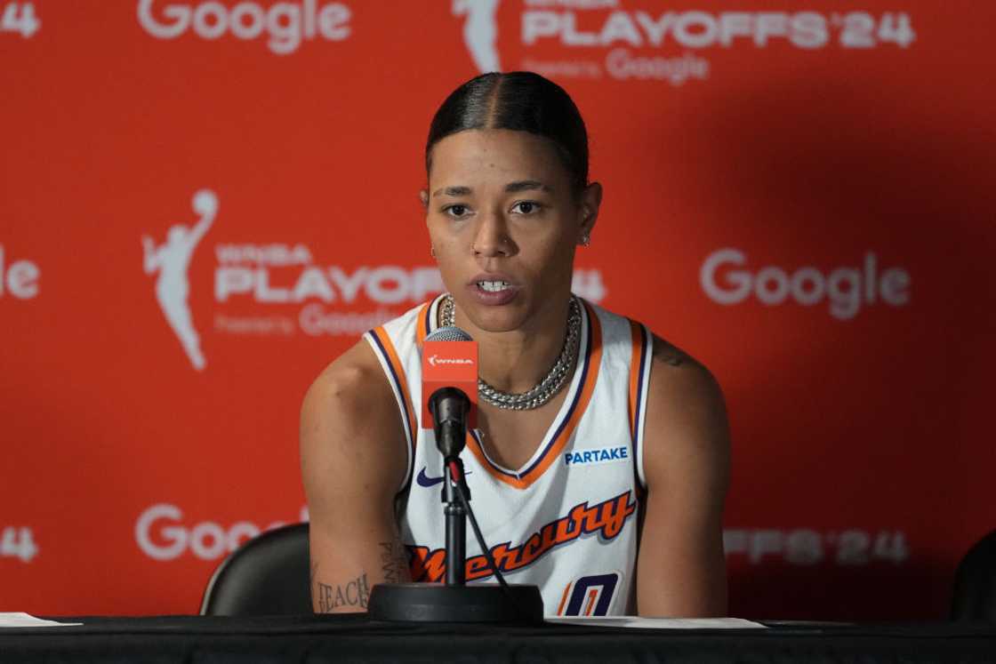 Natasha Cloud speaks during a press conference