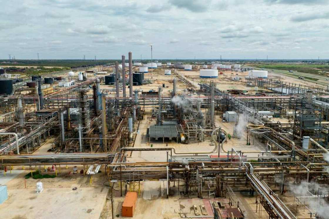 ExxonMobil and Chevron describe recent transactions as a balanced approach, but critics say they are locking the companies into fossil fuels for the long-term ExxonMobil and Chevron describe recent transactions as a balanced approach, but critics say they are locking the companies into fossil fuels for the long-term