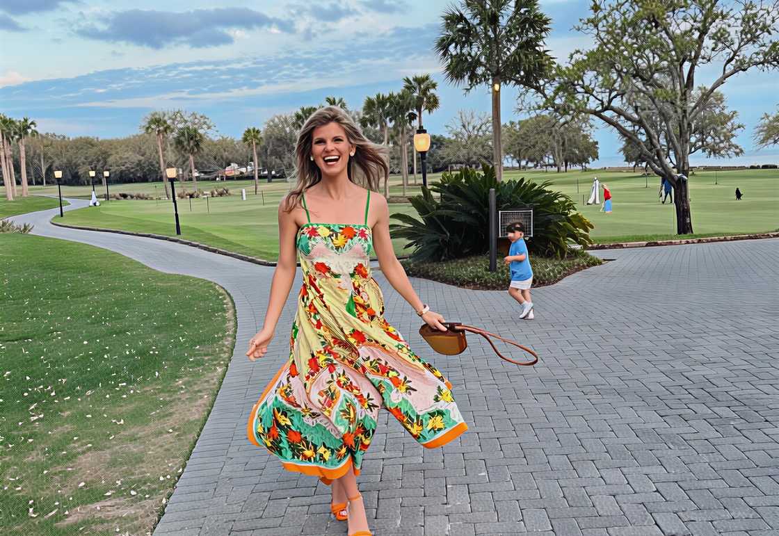 Brighton Butler posing in a floral dress outdoor Brighton Butler posing in a floral dress outdoor
