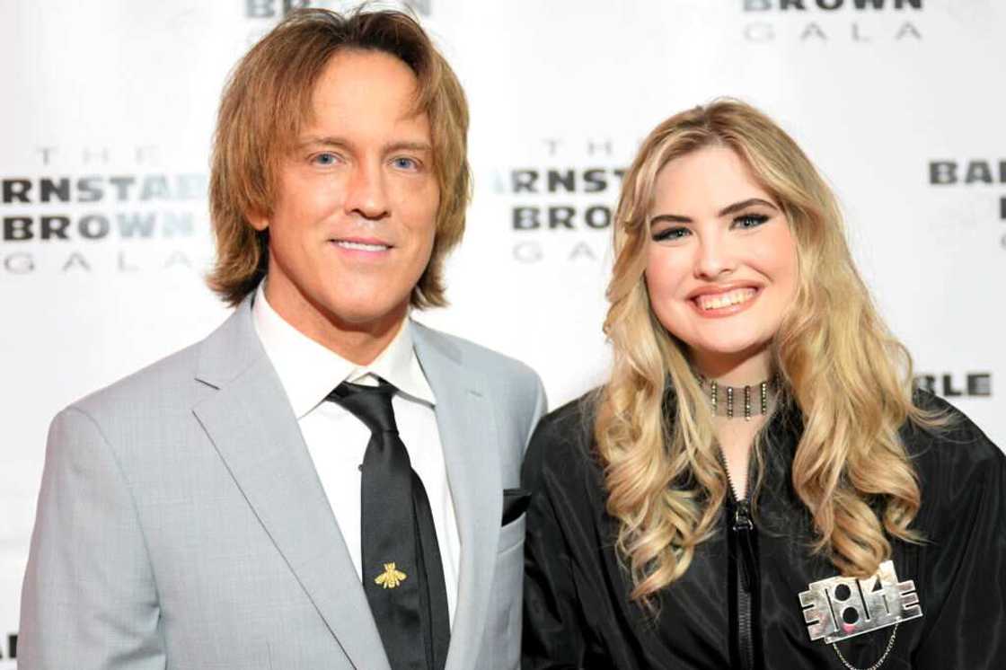 Larry Birkhead and his daughter, Dannielynn, attend an event Larry Birkhead and his daughter, Dannielynn, attend an event