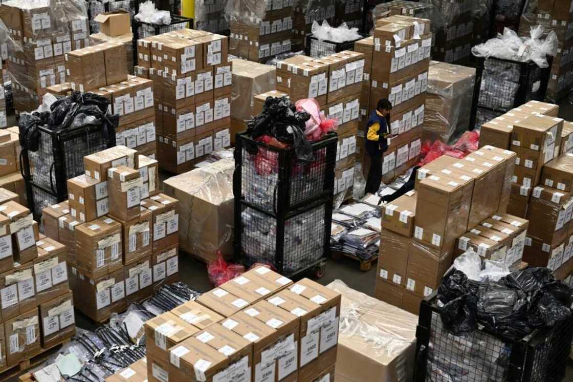 Ballot boxes stand ready inside a warehouse ahead of the vote