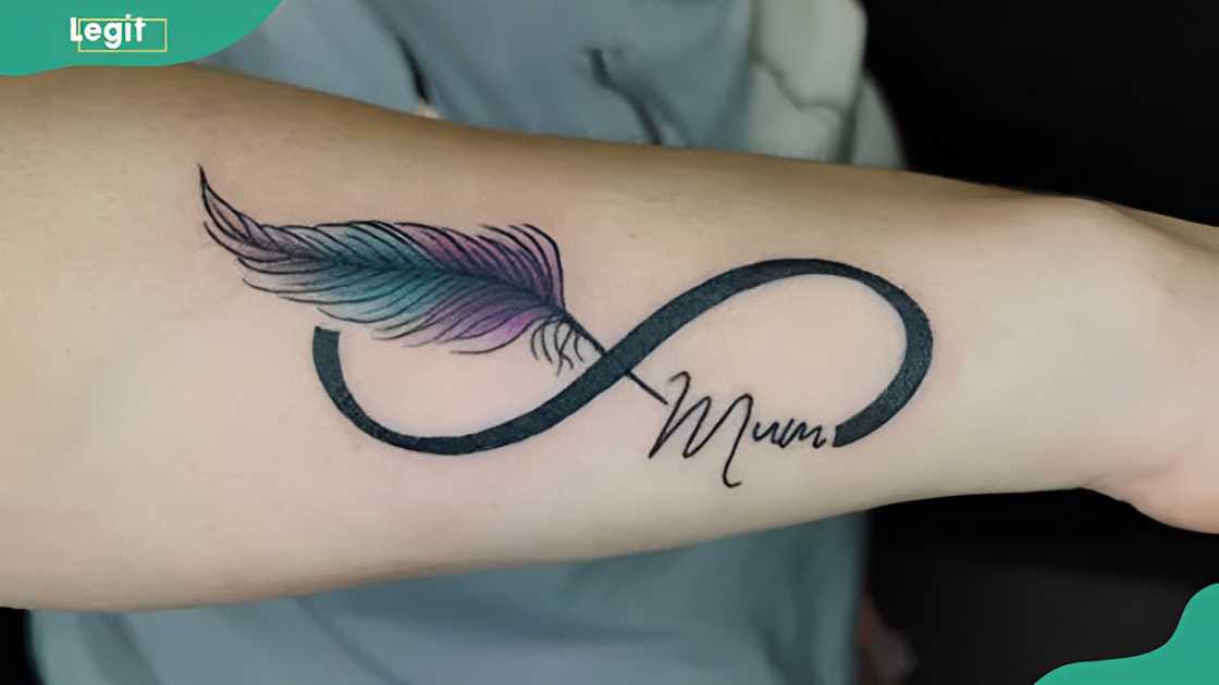 Freedom feather and name tattoo